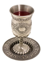 a kiddush cup with wine